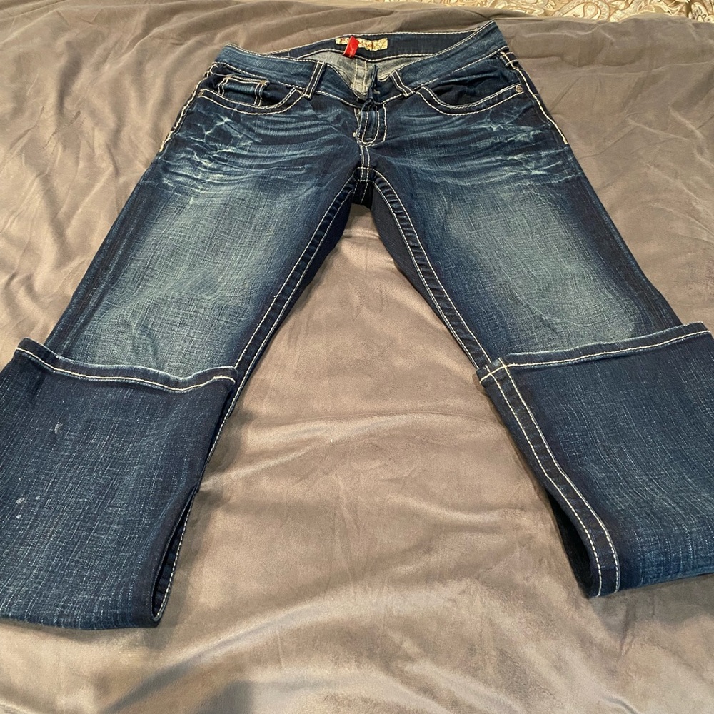 BKE culture brand  dark blue distressed denim jeans.